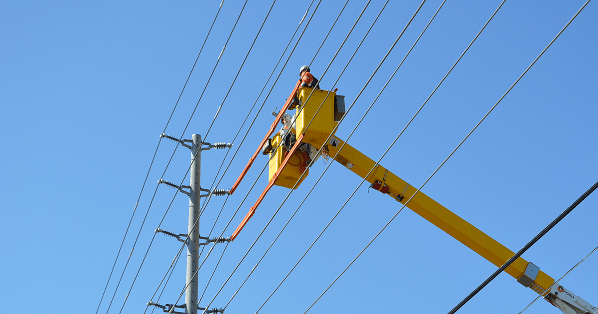 men working on power lines