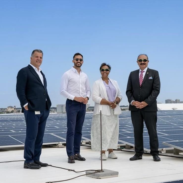 group photo with solar panels